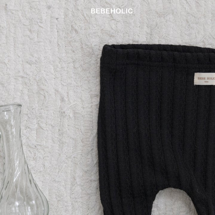 【bebeholic】 Leather foot leggings